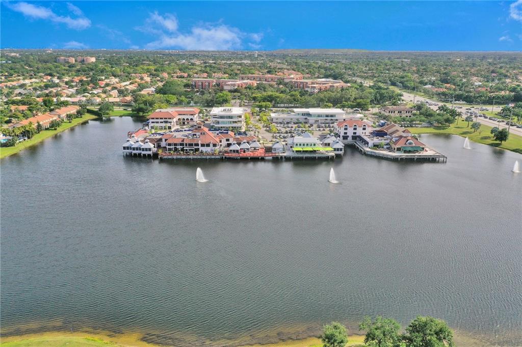 6698 Montego Bay Boulevard, Unit D Boca Raton, FL 33433 - Photo 35 of 44 an aerial view of residential houses with outdoor space