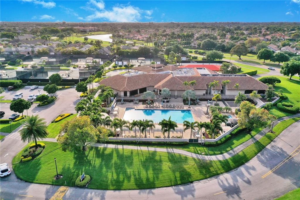 6698 Montego Bay Boulevard, Unit D Boca Raton, FL 33433 - Photo 41 of 44 an aerial view of residential houses with outdoor space and swimming pool