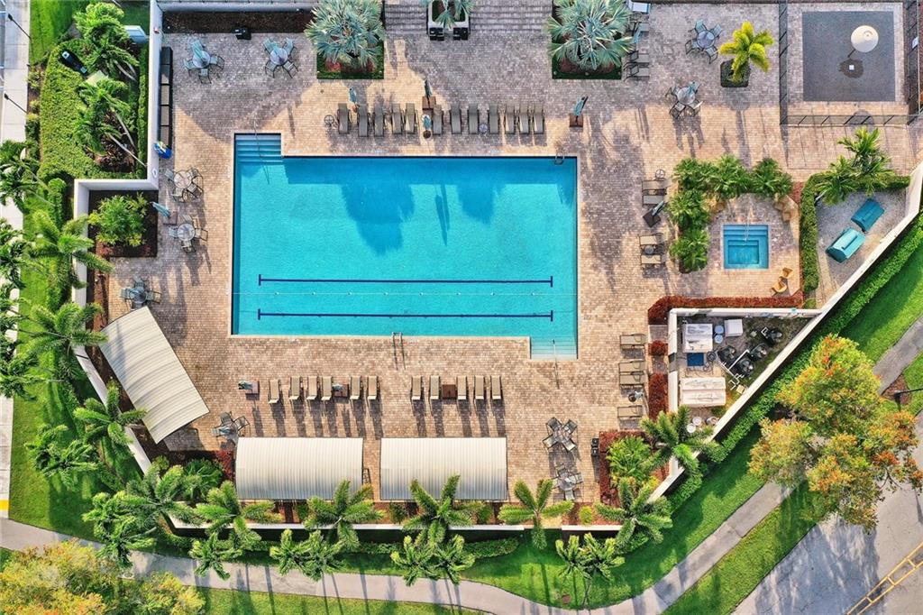 6698 Montego Bay Boulevard, Unit D Boca Raton, FL 33433 - Photo 42 of 44 a front view of a house with garden