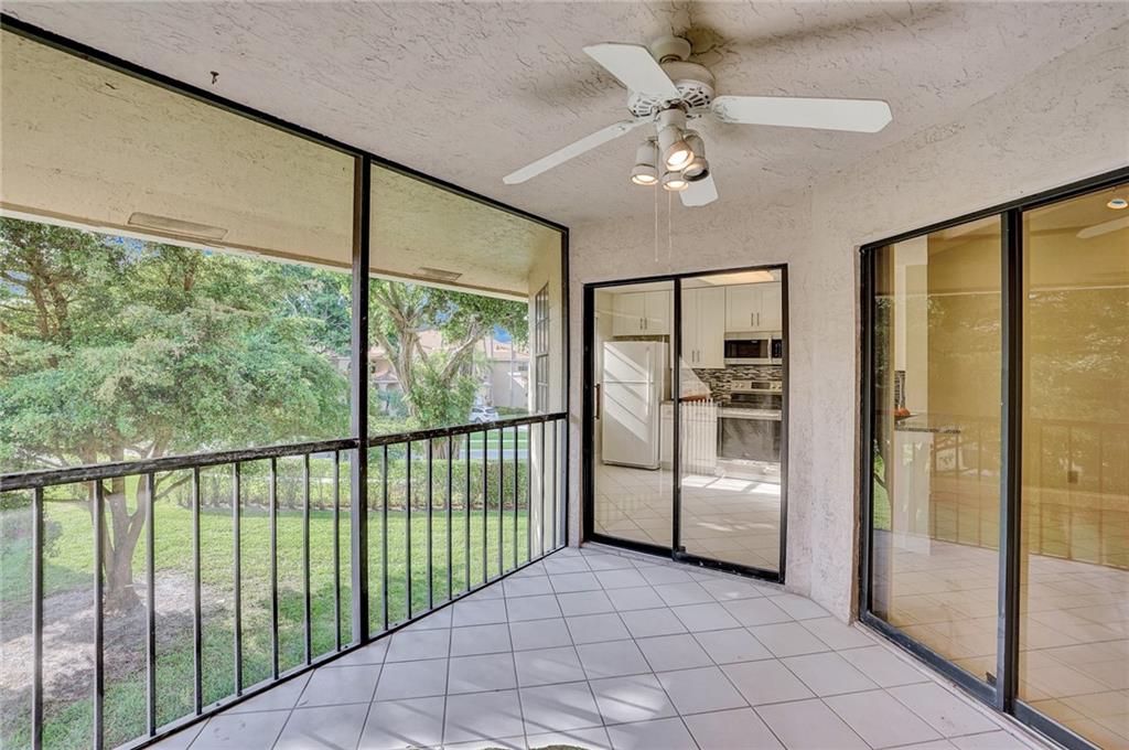 6698 Montego Bay Boulevard, Unit D Boca Raton, FL 33433 - Photo 6 of 44 a view of a hallway with closet