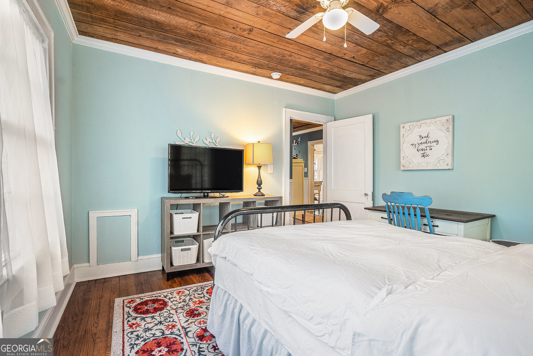 17 West Wright Street Winder, GA 30680 - Photo 21 of 31 a bedroom with a bed and a flat screen tv