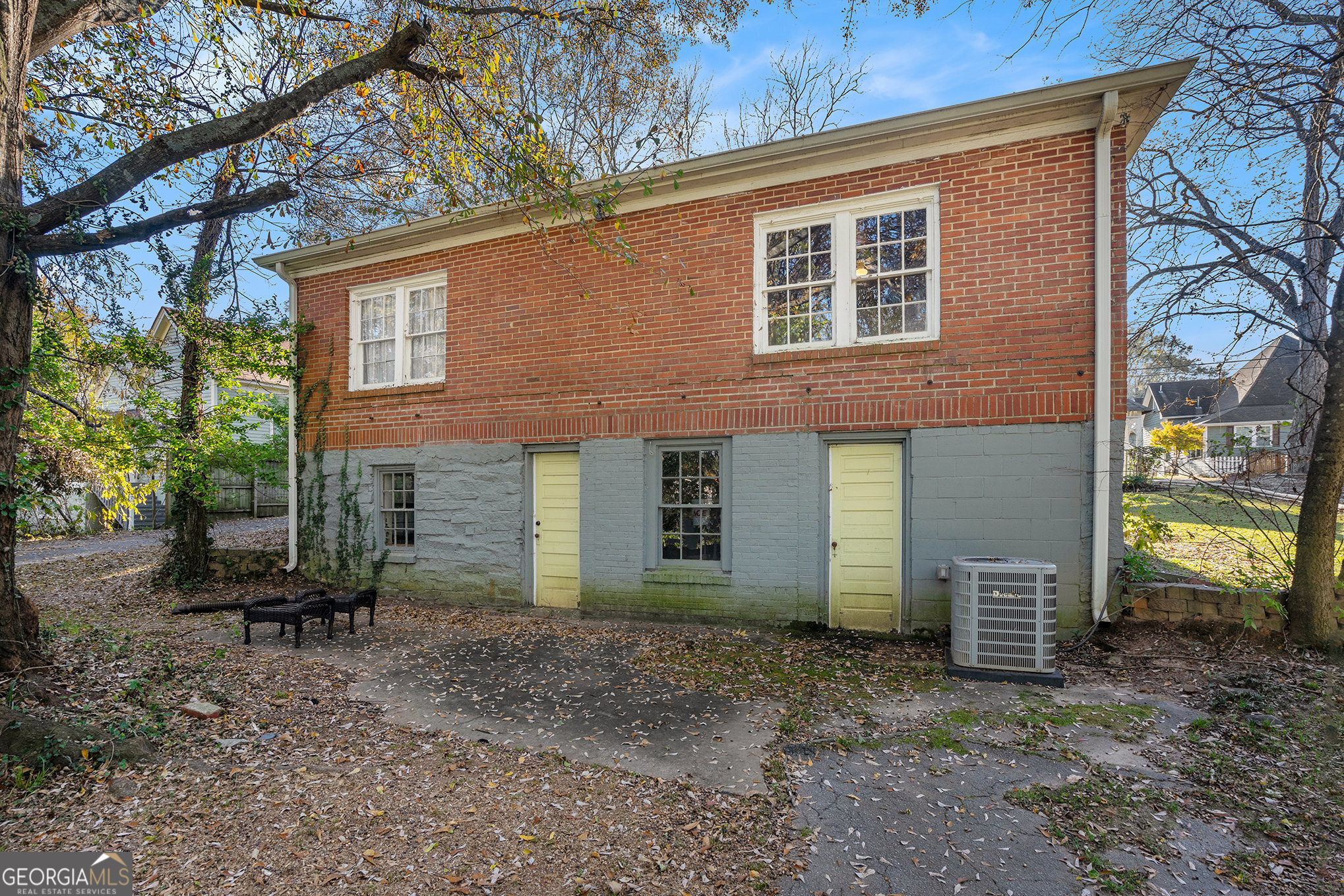 17 West Wright Street Winder, GA 30680 - Photo 28 of 31 a view of a backyard with plants and a large tree