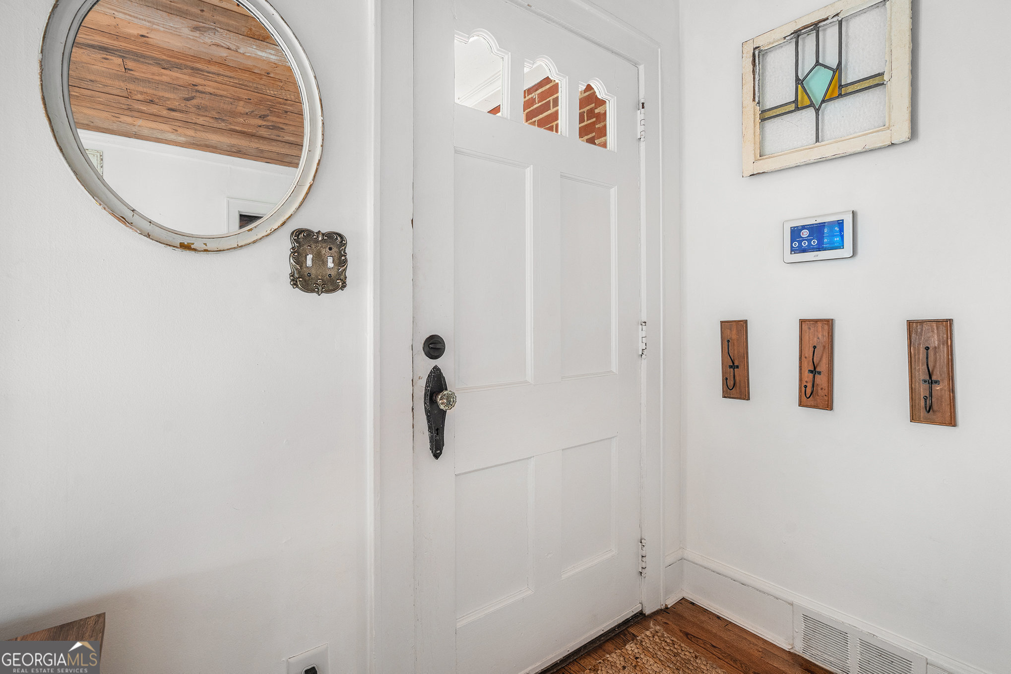 17 West Wright Street Winder, GA 30680 - Photo 4 of 31 a bathroom with a shower and a mirror