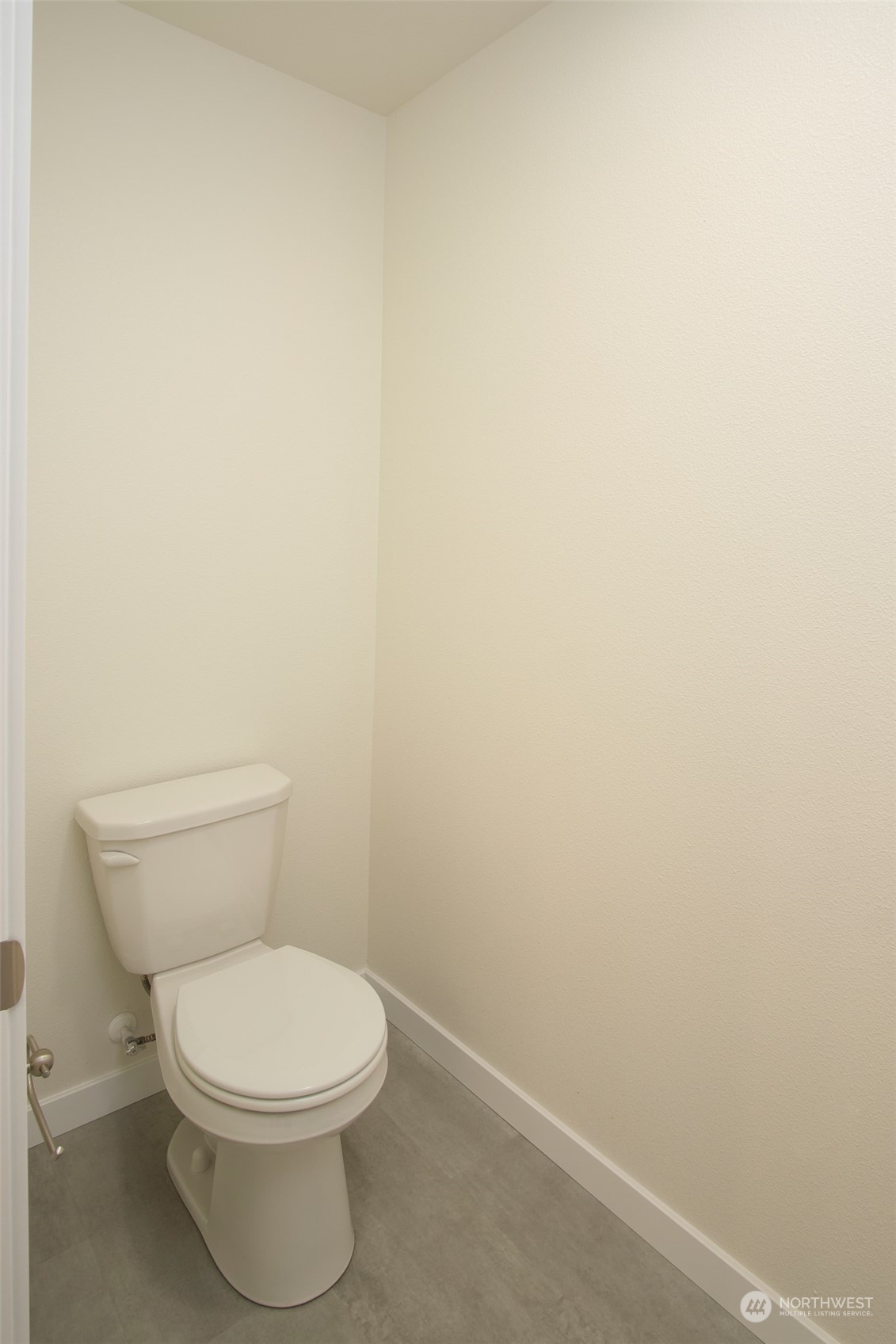 1080 Rw Fletcher Street Winlock, WA 98596 - Photo 17 of 27 a white toilet sitting next to a white wall