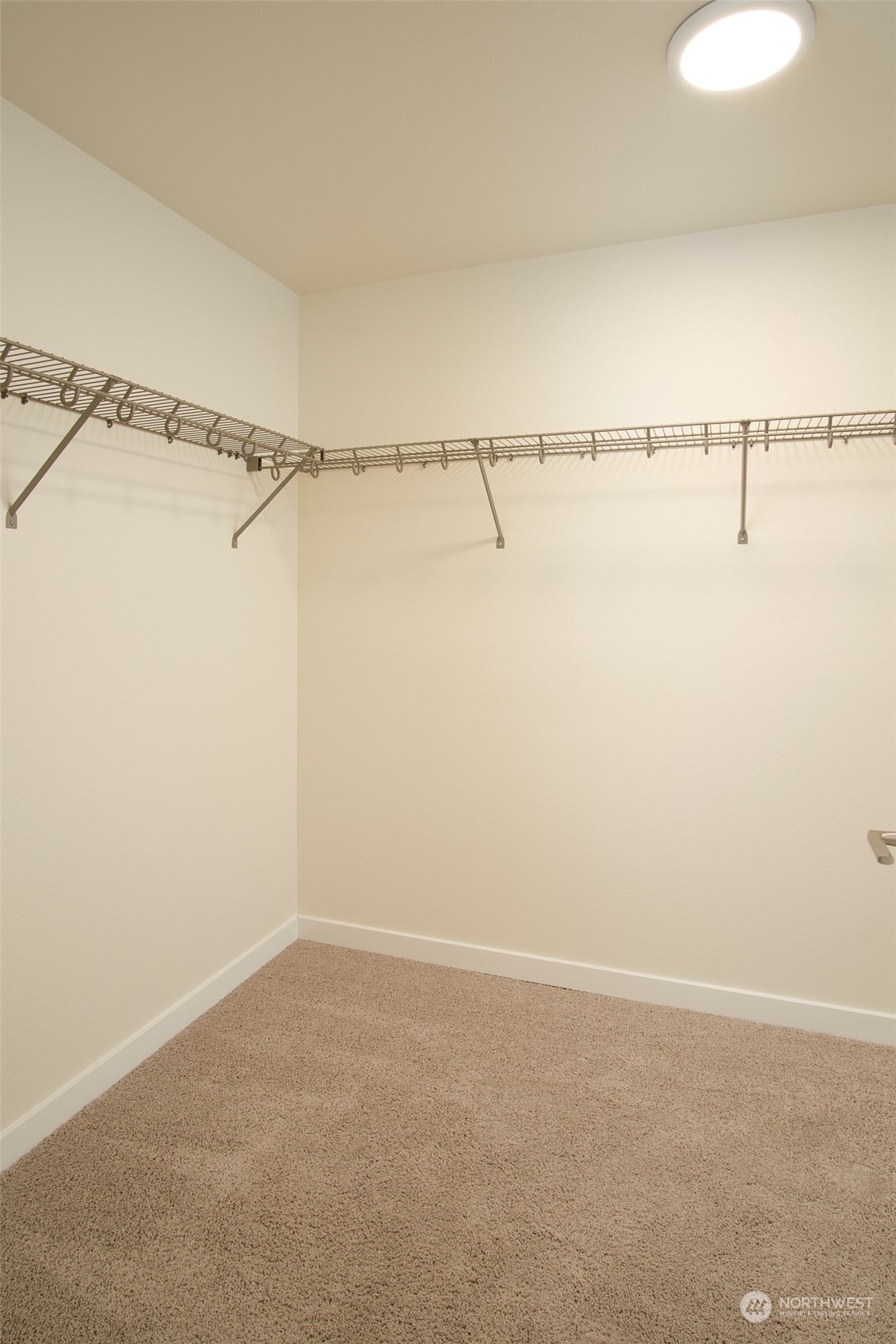 1080 Rw Fletcher Street Winlock, WA 98596 - Photo 18 of 27 a view of a room with racks on the wall