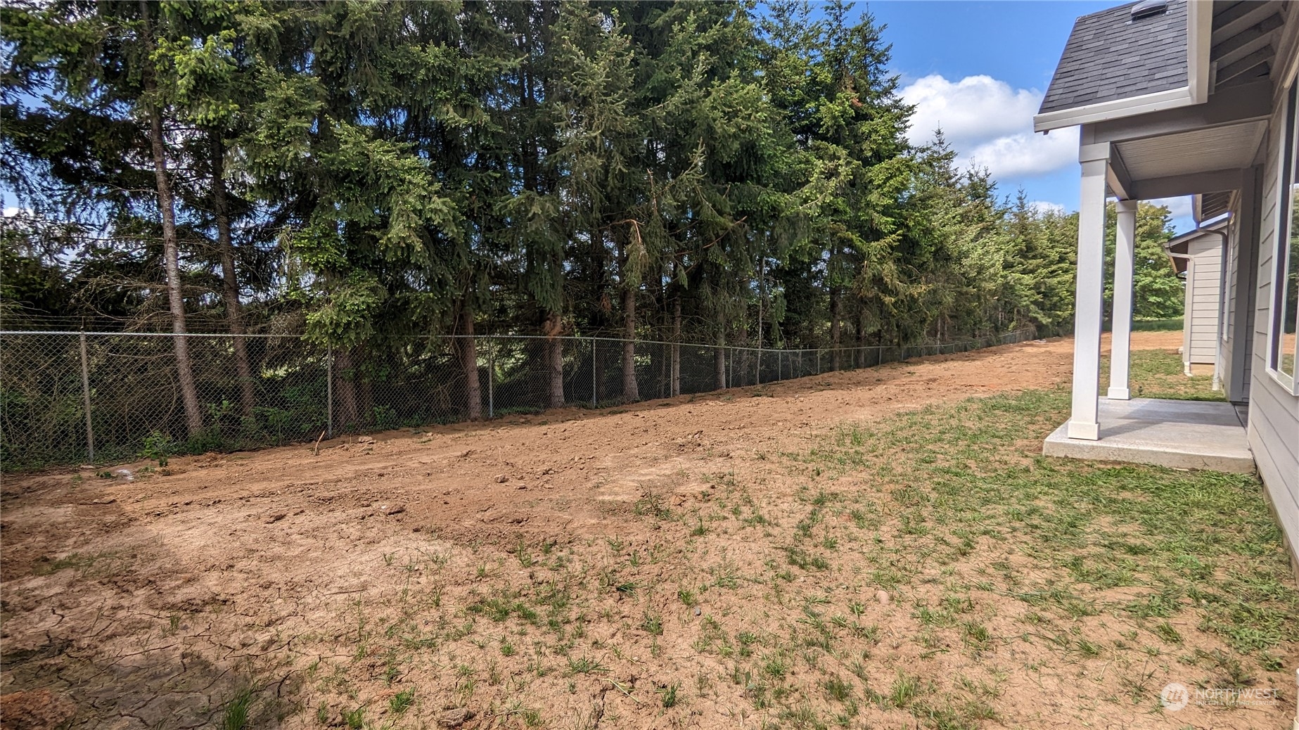 1080 Rw Fletcher Street Winlock, WA 98596 - Photo 27 of 27 a backyard of a house with lots of green space