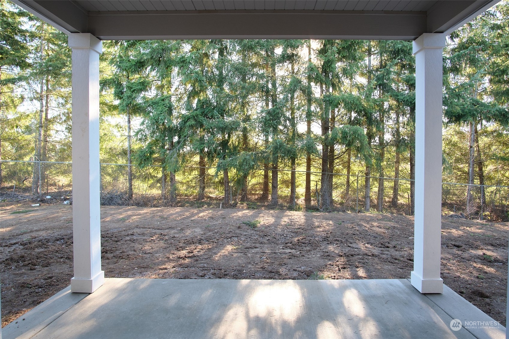 1080 Rw Fletcher Street Winlock, WA 98596 - Photo 5 of 27 a view of a yard with large trees