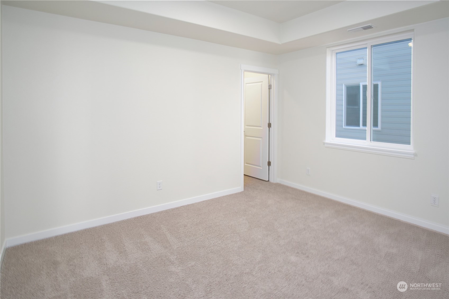 1080 Rw Fletcher Street Winlock, WA 98596 - Photo 9 of 27 an empty room with windows