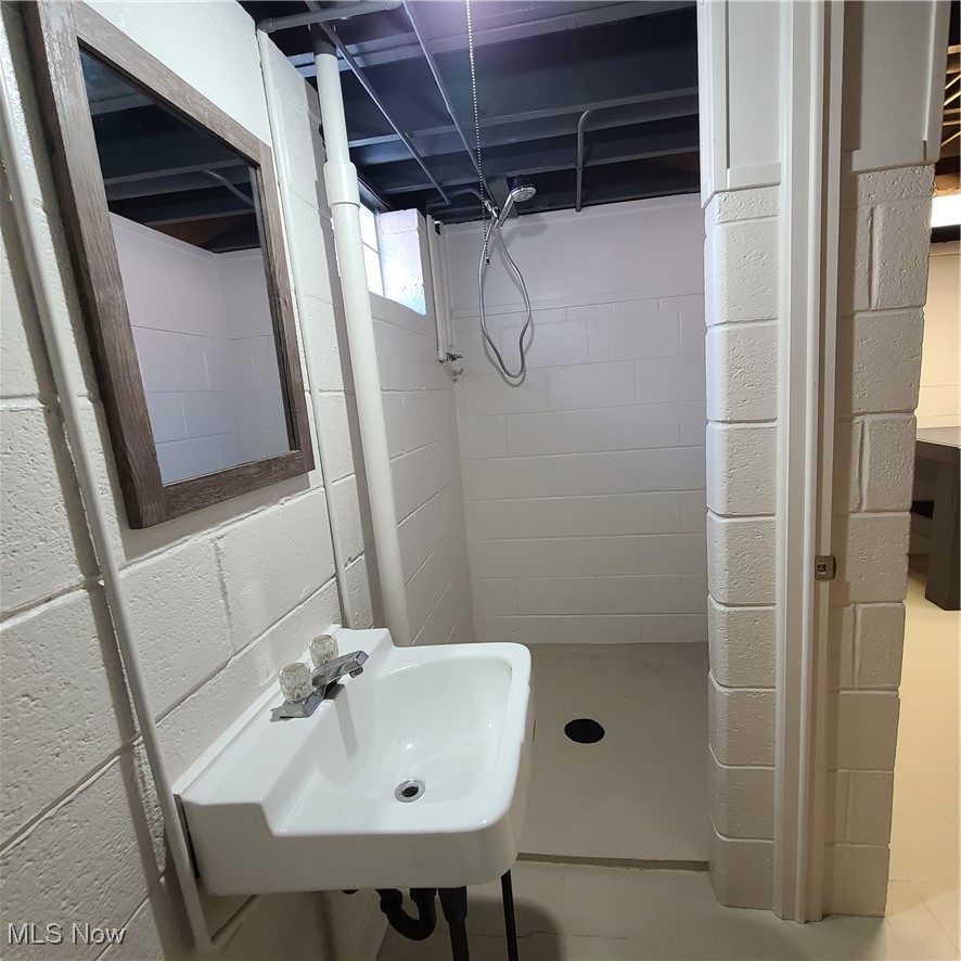 12204 Grannis Road Garfield Heights, OH 44125 - Photo 19 of 22 Lower level full bath features walk-in shower