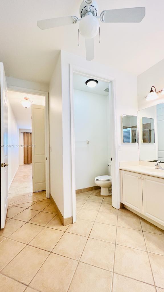 1475 Scilly Cay Lane, Unit 1475 Jupiter, FL 33458 - Photo 11 of 29 a bathroom with a sink a toilet and shower