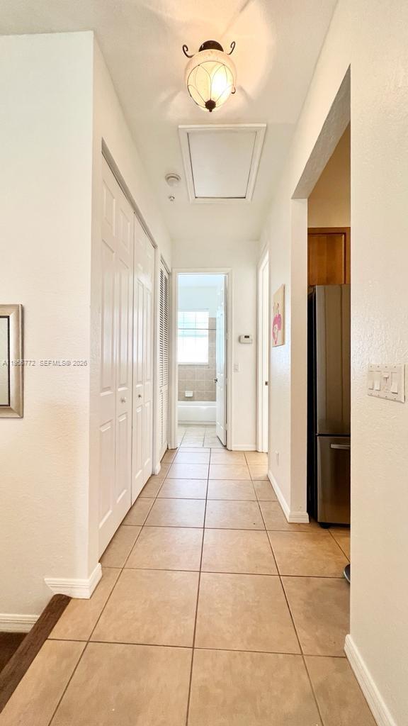 1475 Scilly Cay Lane, Unit 1475 Jupiter, FL 33458 - Photo 19 of 29 a bathroom with a bathtub and shower