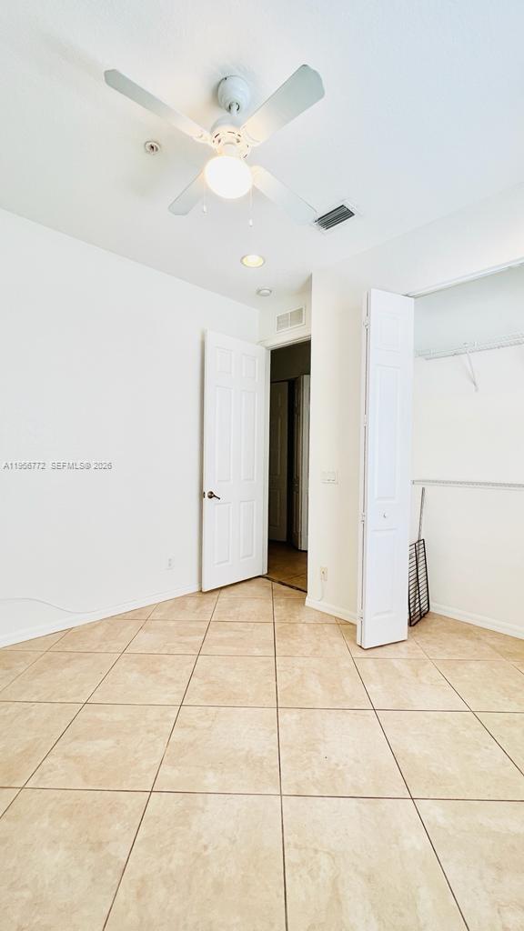 1475 Scilly Cay Lane, Unit 1475 Jupiter, FL 33458 - Photo 27 of 29 a view of an empty room with a window