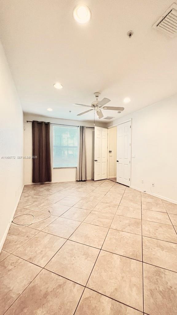 1475 Scilly Cay Lane, Unit 1475 Jupiter, FL 33458 - Photo 6 of 29 a view of empty room with wooden floor