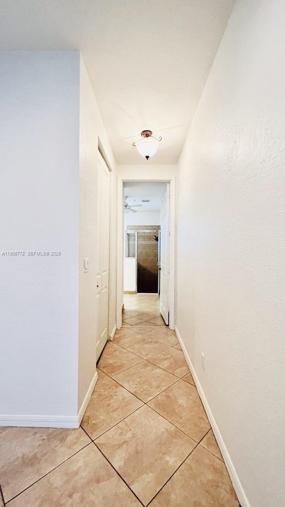 1475 Scilly Cay Lane, Unit 1475 Jupiter, FL 33458 - Photo 7 of 29 a view of an empty room with a bathroom