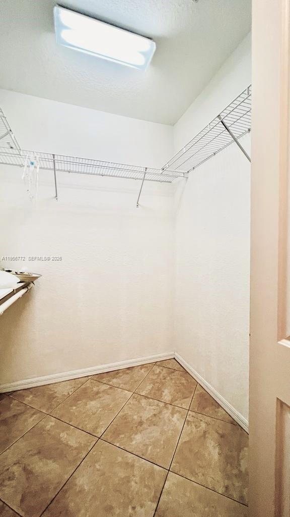 1475 Scilly Cay Lane, Unit 1475 Jupiter, FL 33458 - Photo 8 of 29 a view of a room with racks on the wall