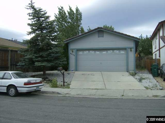 6832 Forsythia Way Reno, NV 89506 - Photo 1 of 2 a view of a car parked in front of house