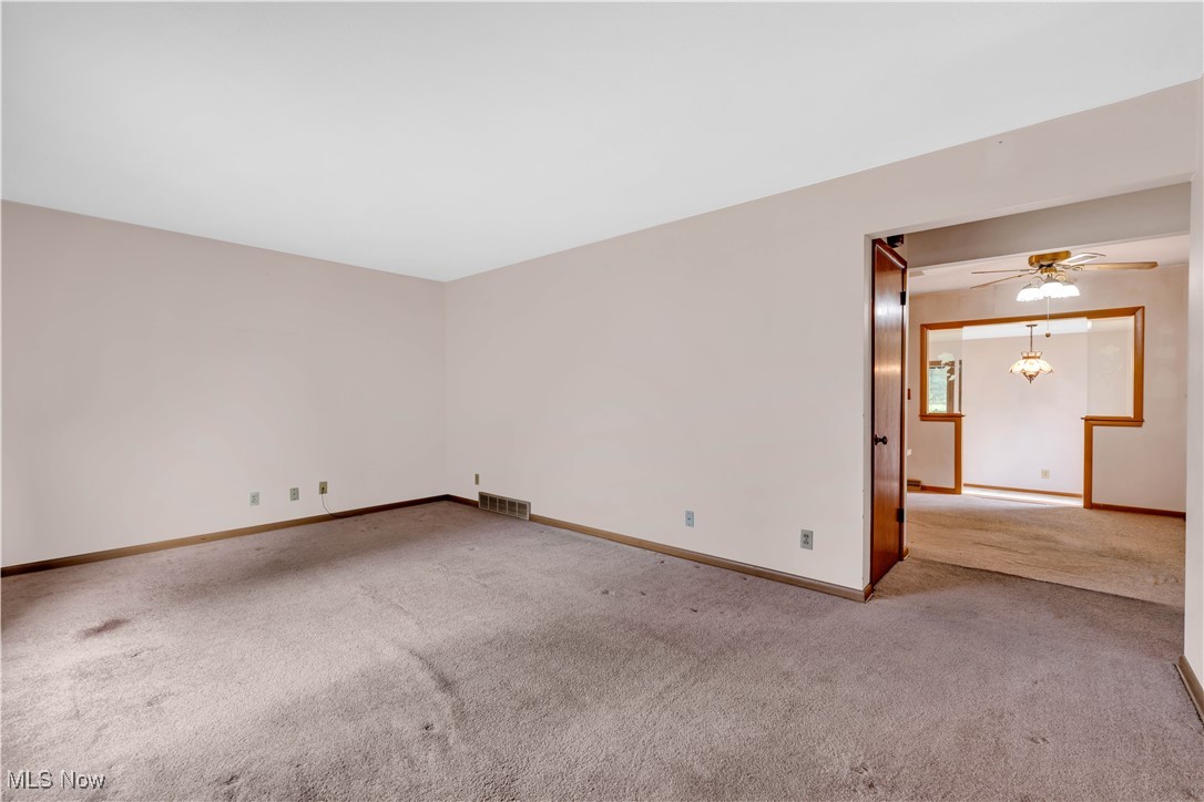 38450 Otten Road North Ridgeville, OH 44039 - Photo 17 of 45 Carpeted empty room featuring ceiling fan and baseboards