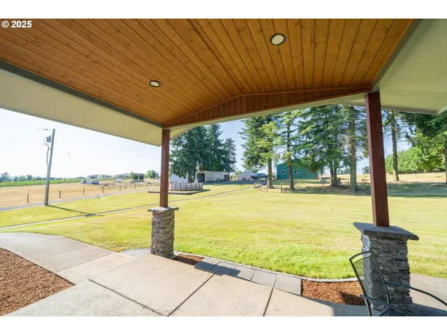 a view of swimming pool with outdoor seating