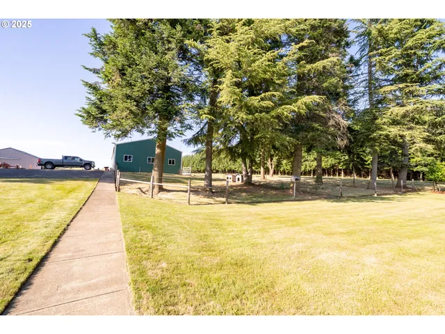 a view of swimming pool with seating area
