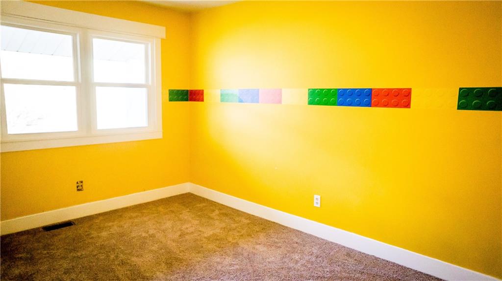 450 Leslie Road Valencia, PA 16059 - Photo 15 of 25 One of two additional bedrooms on the upper floor.
