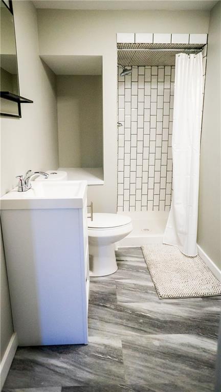 450 Leslie Road Valencia, PA 16059 - Photo 17 of 25 The lower level has a full bath with updated fixtures.