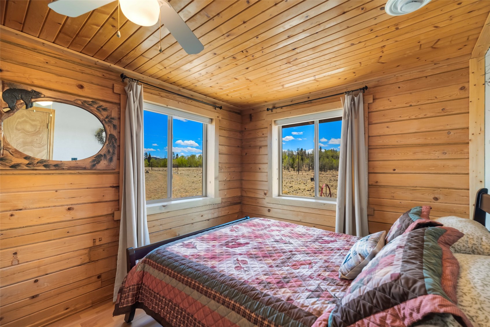 15 Mallard Road Como, CO 80432 - Photo 25 of 49 a bed sitting in a bedroom next to a window