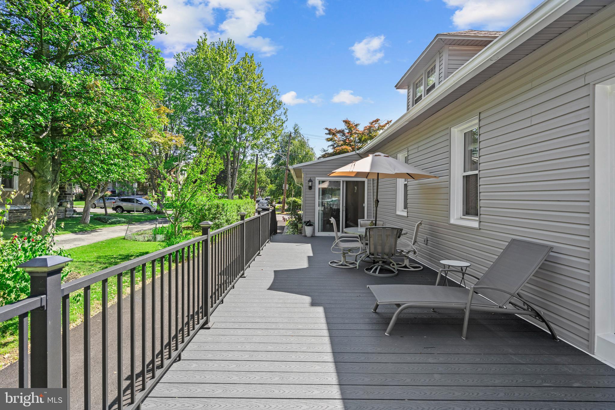 1118 Allston Road Havertown, PA 19083 - Photo 4 of 58 a view of a patio with table and chairs with wooden floor and fence