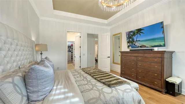 a bathroom with a granite countertop sink a mirror a shower and a bathtub