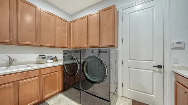 a view of a fountain in the back yard of the house