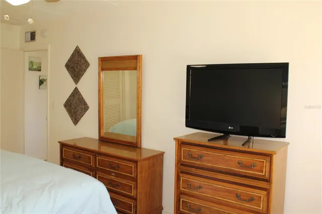 a bathroom with a sink and shower