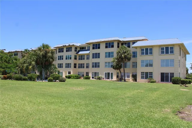 a kitchen with a sink cabinets and a window