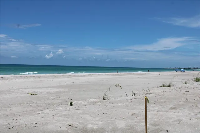 a sign broad on the side of the road