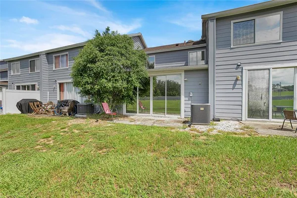 a front view of a house with a garden and porch