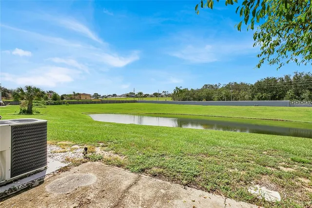 a view of a golf course with a lake