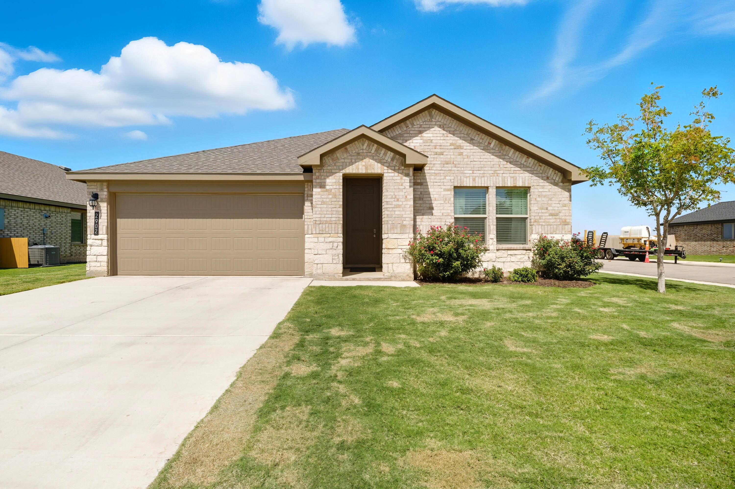 2902 133rd Street Lubbock, TX 79423 - Photo 2 of 38 a view of a house with backyard and garden