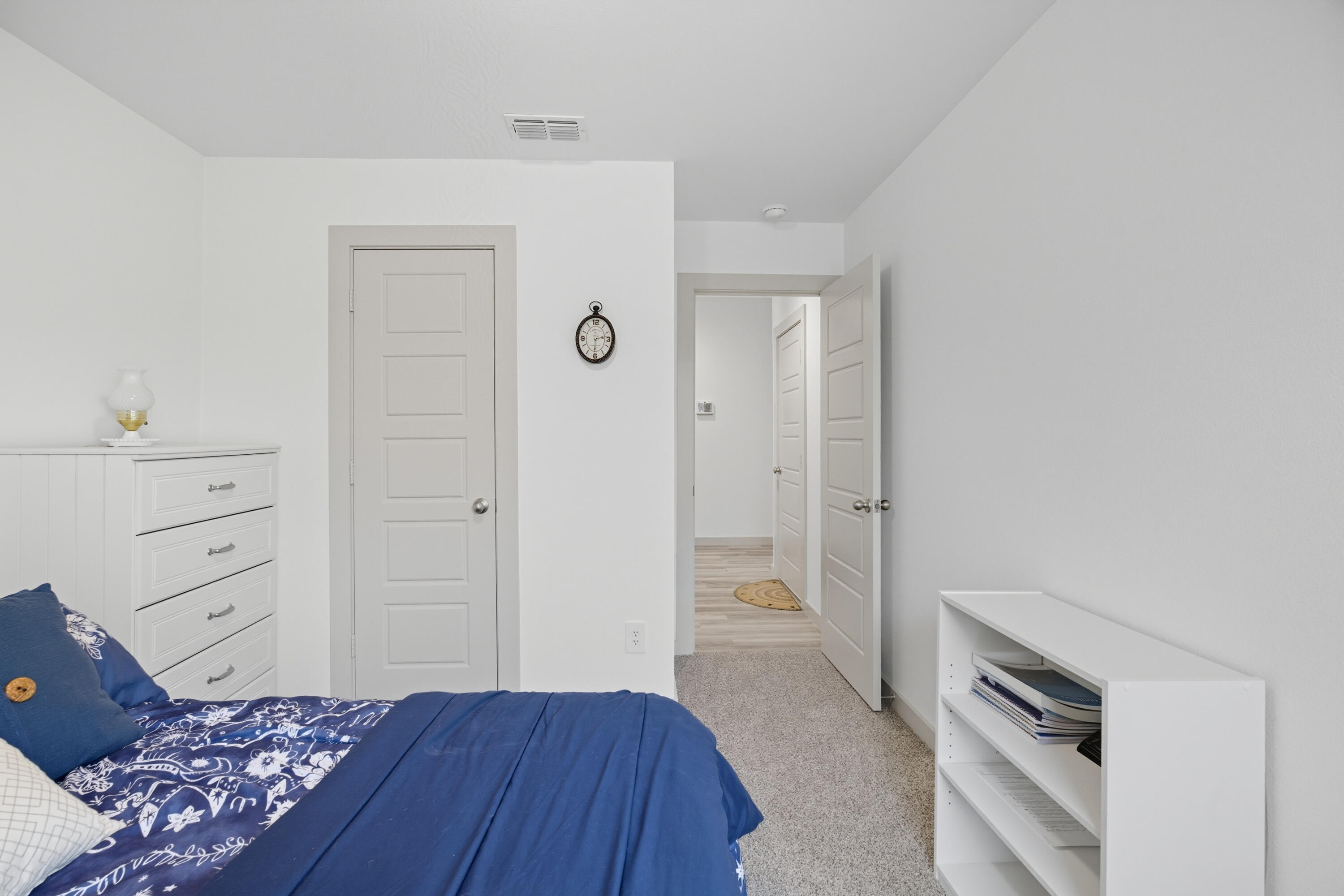2902 133rd Street Lubbock, TX 79423 - Photo 26 of 38 a view of a bedroom with closet and cabinet