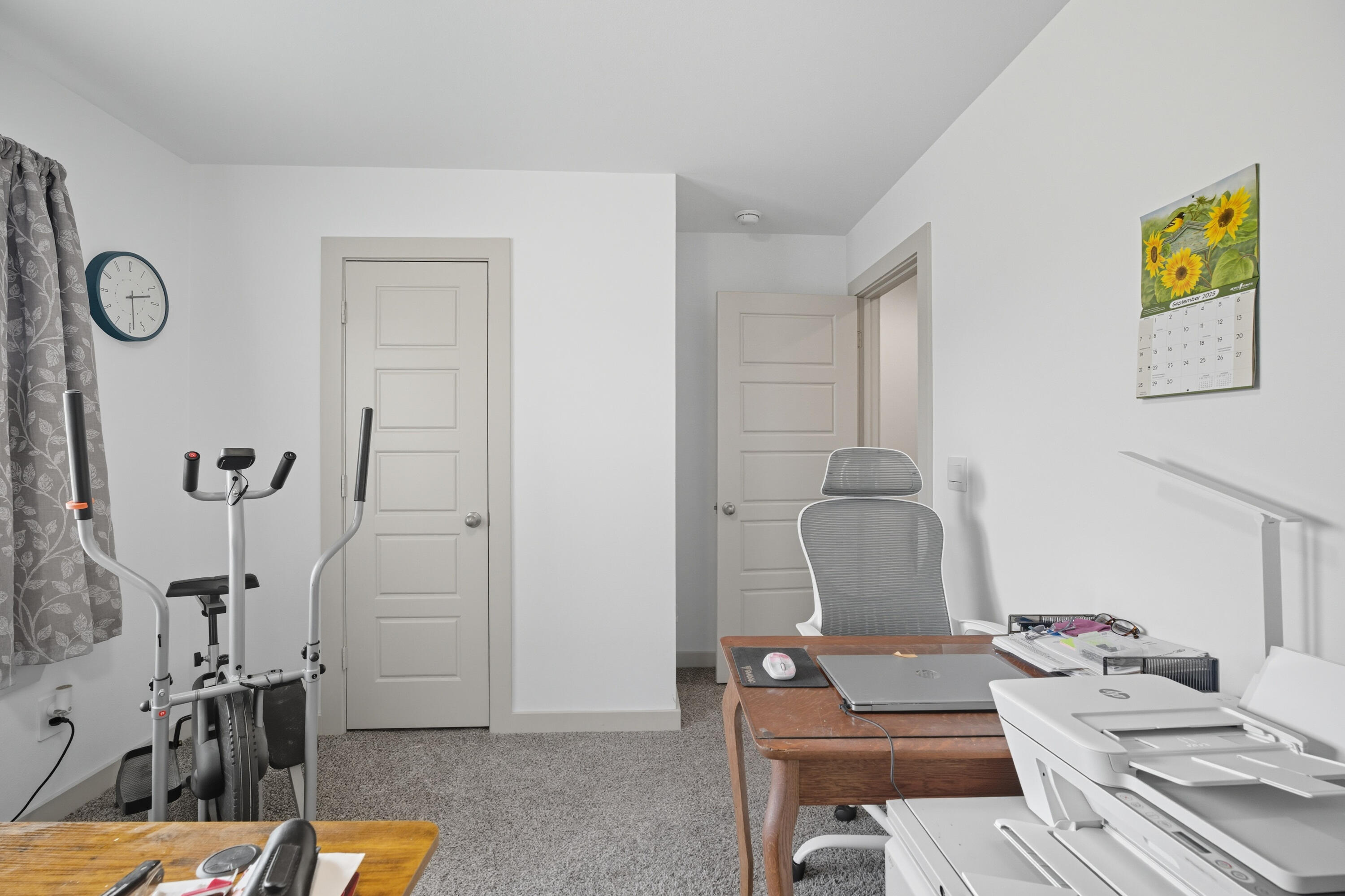 2902 133rd Street Lubbock, TX 79423 - Photo 30 of 38 a living room with furniture and a wooden floor