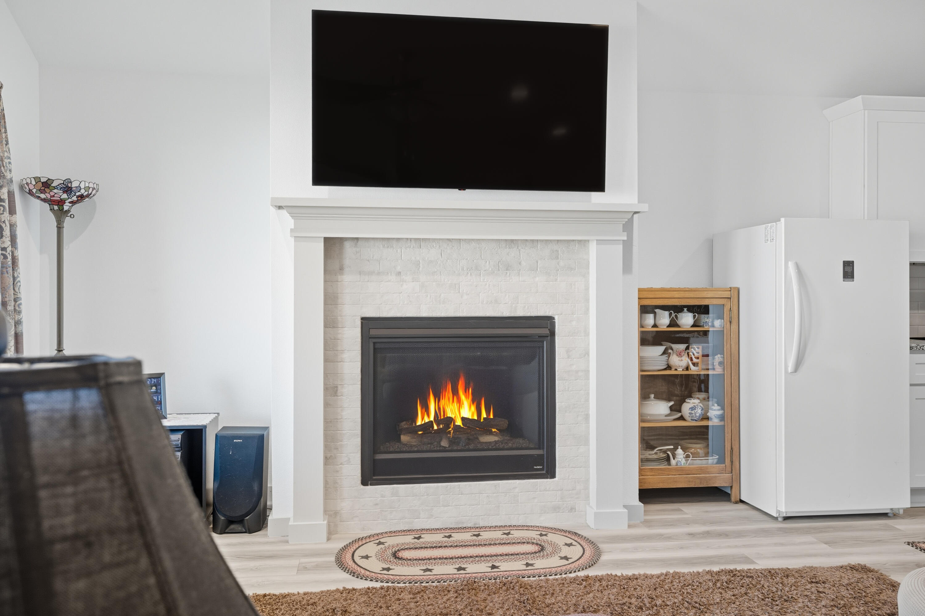 2902 133rd Street Lubbock, TX 79423 - Photo 8 of 38 a living room with furniture and a fireplace