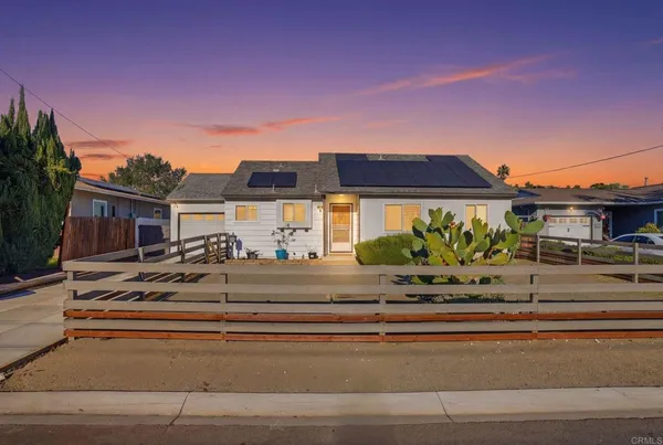 a front view of a house with a porch