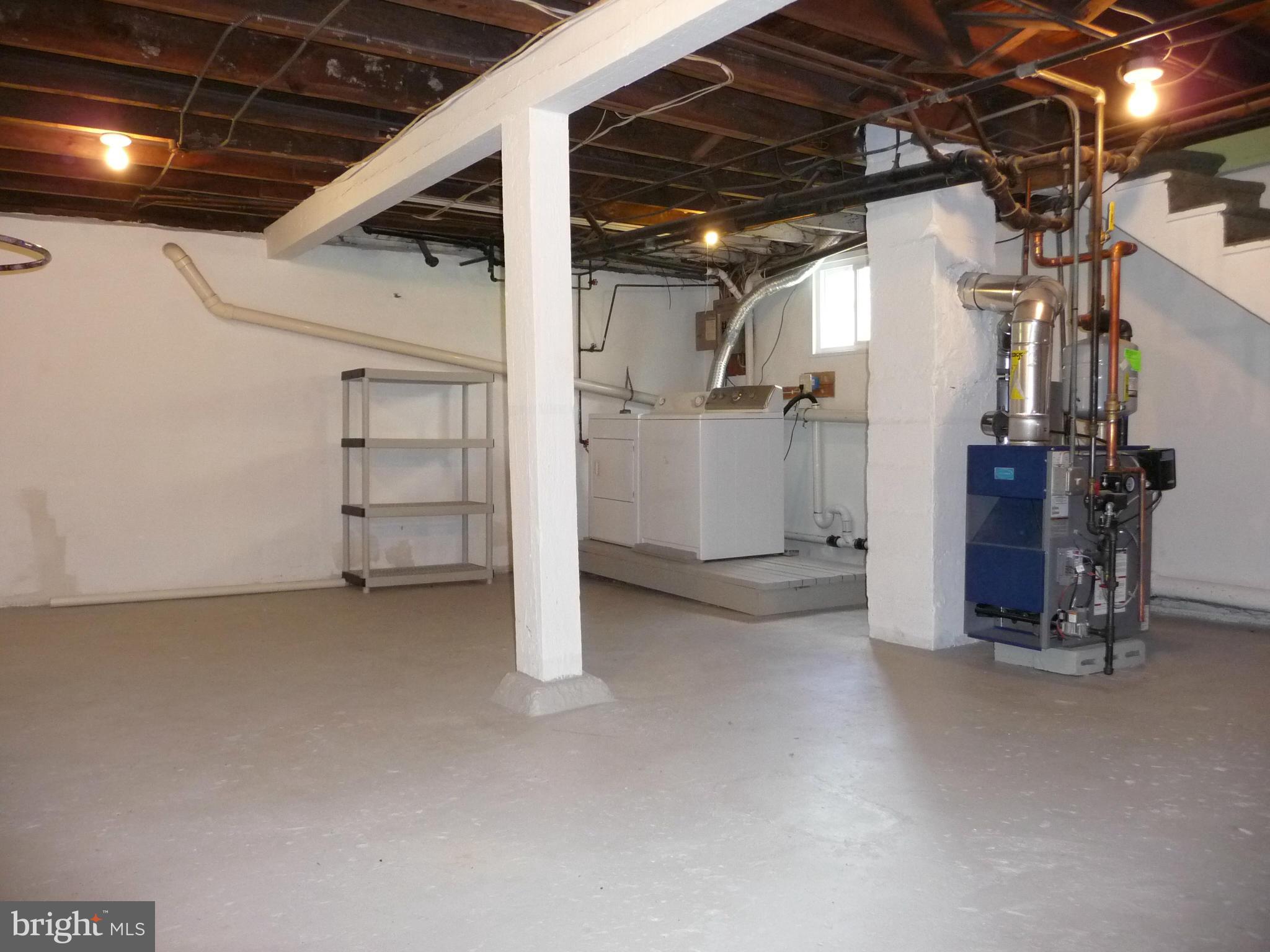 409 Walcott Road Baltimore, MD 21206 - Photo 12 of 27 a view of empty room with wooden ceiling