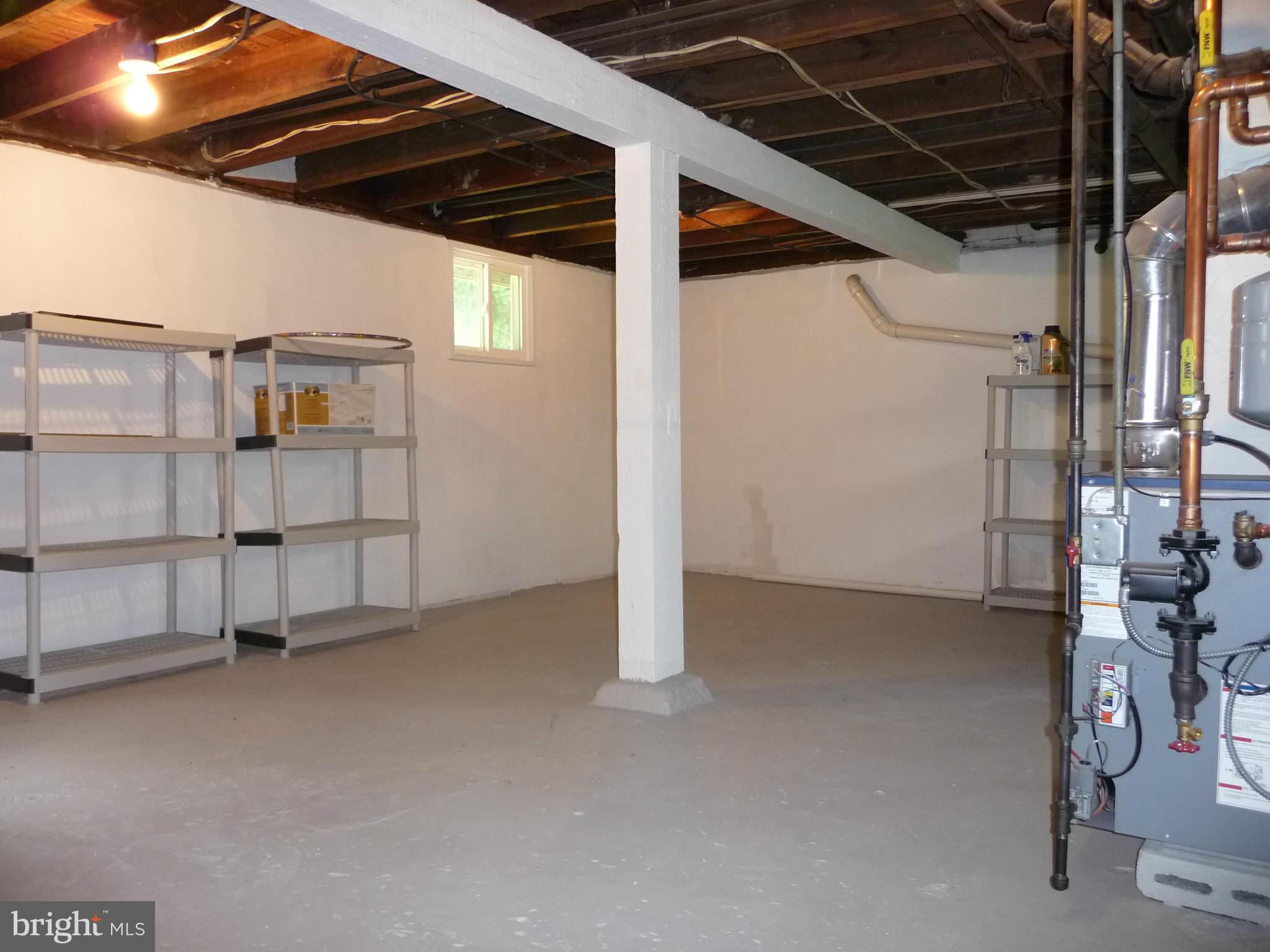 409 Walcott Road Baltimore, MD 21206 - Photo 13 of 27 a view of storage and utility room
