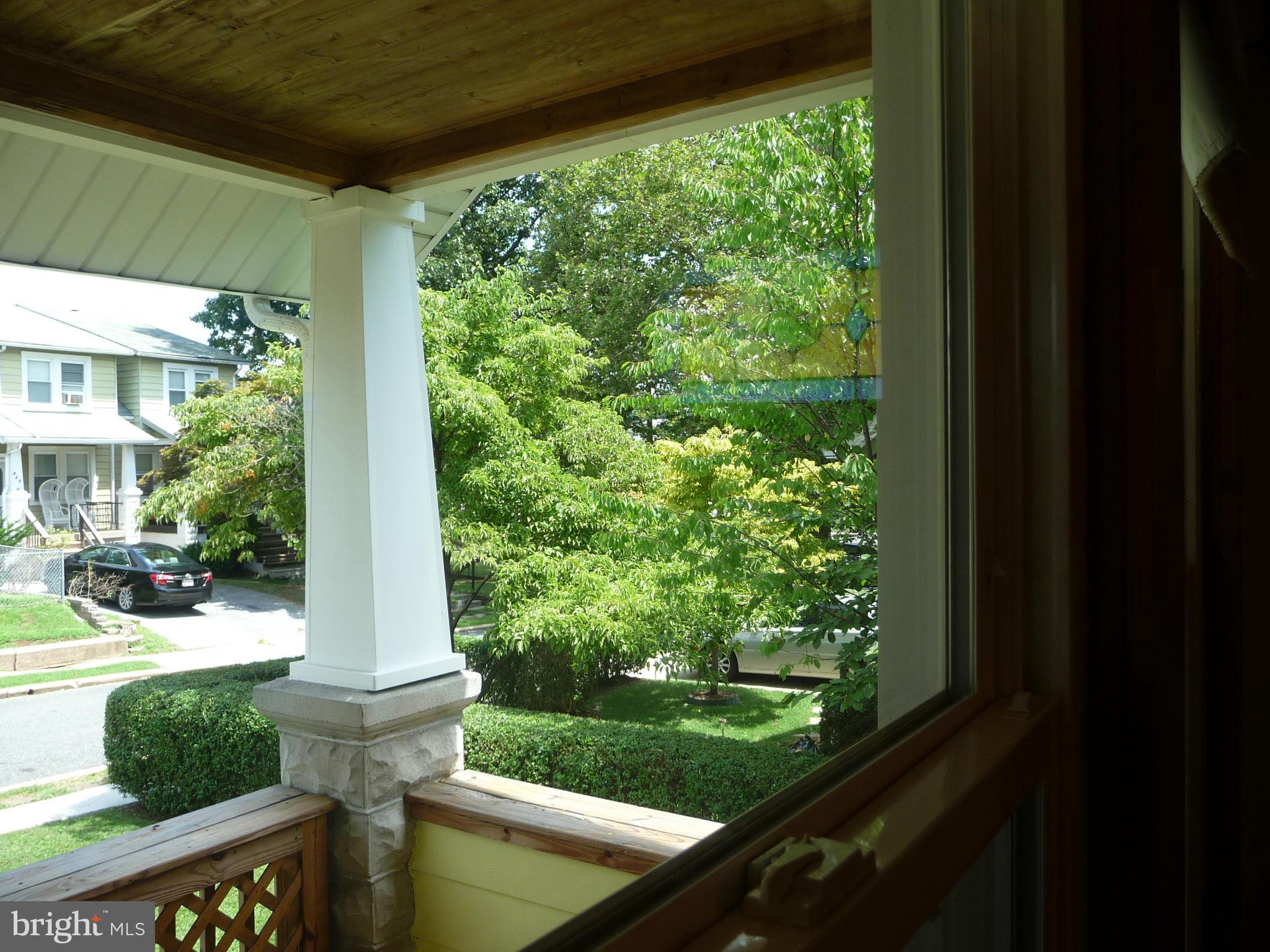 409 Walcott Road Baltimore, MD 21206 - Photo 24 of 27 a view of a porch with furniture and garden view