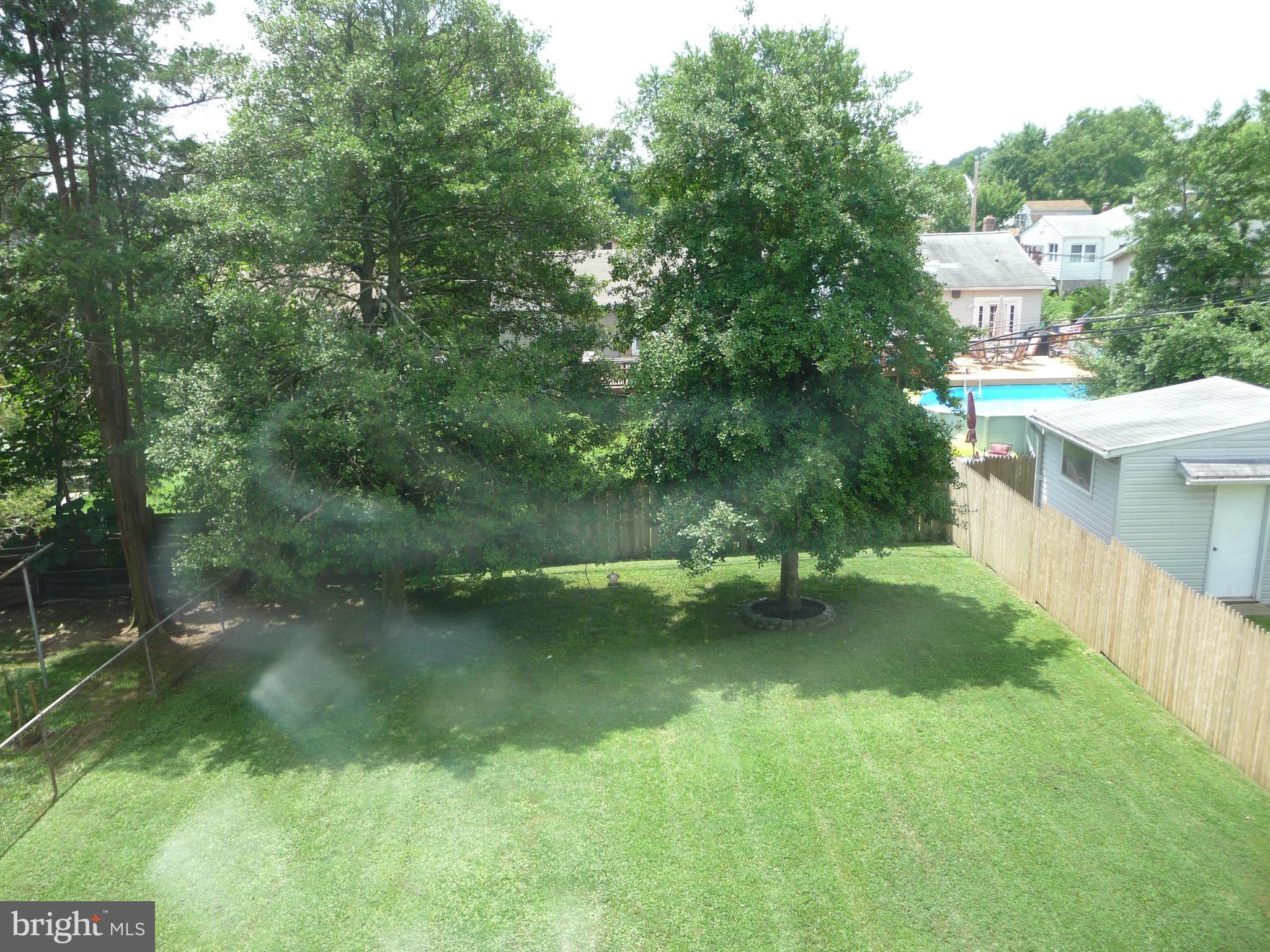 409 Walcott Road Baltimore, MD 21206 - Photo 25 of 27 a view of a lake with houses
