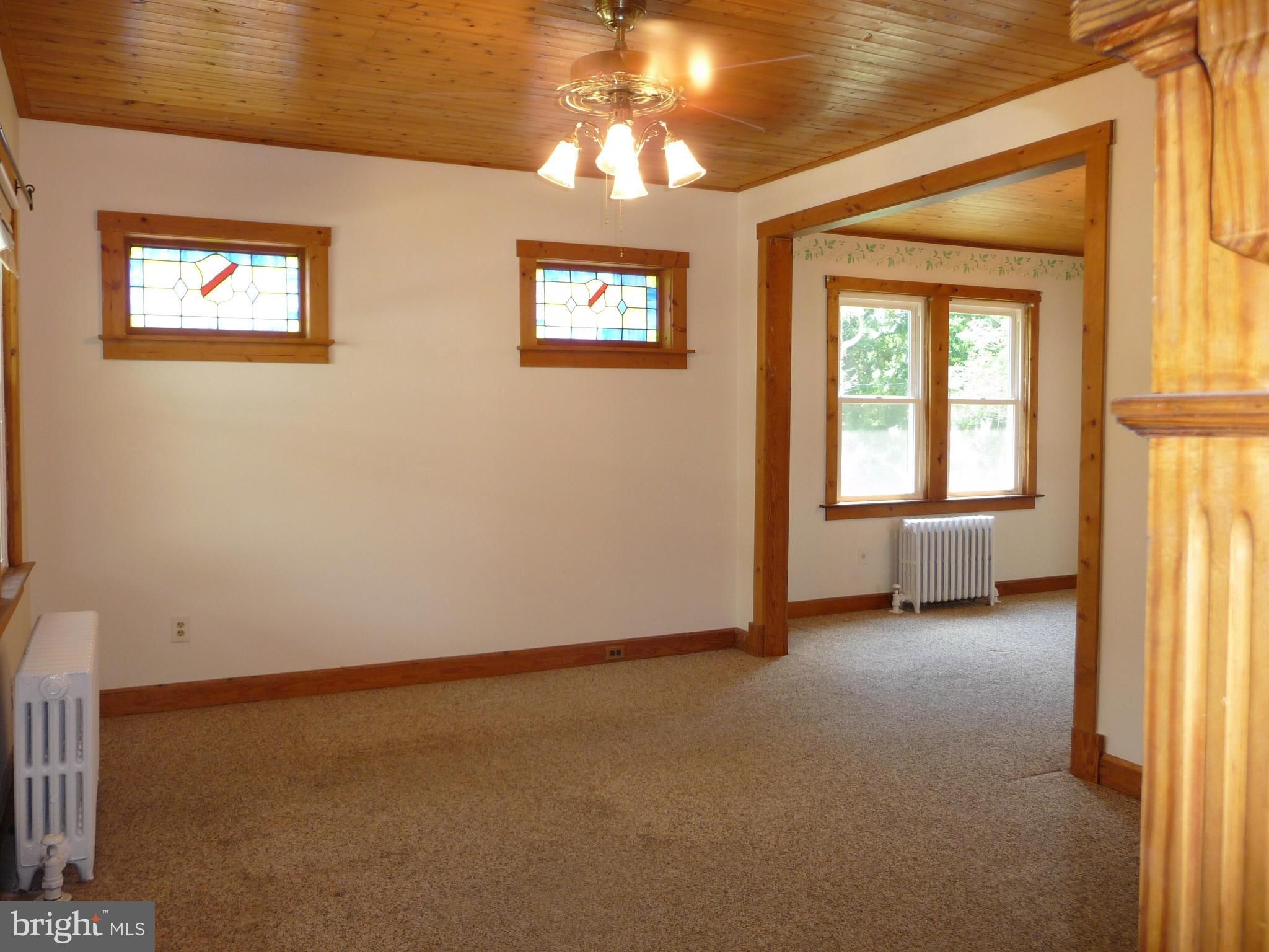 409 Walcott Road Baltimore, MD 21206 - Photo 4 of 27 a view of an empty room with a window