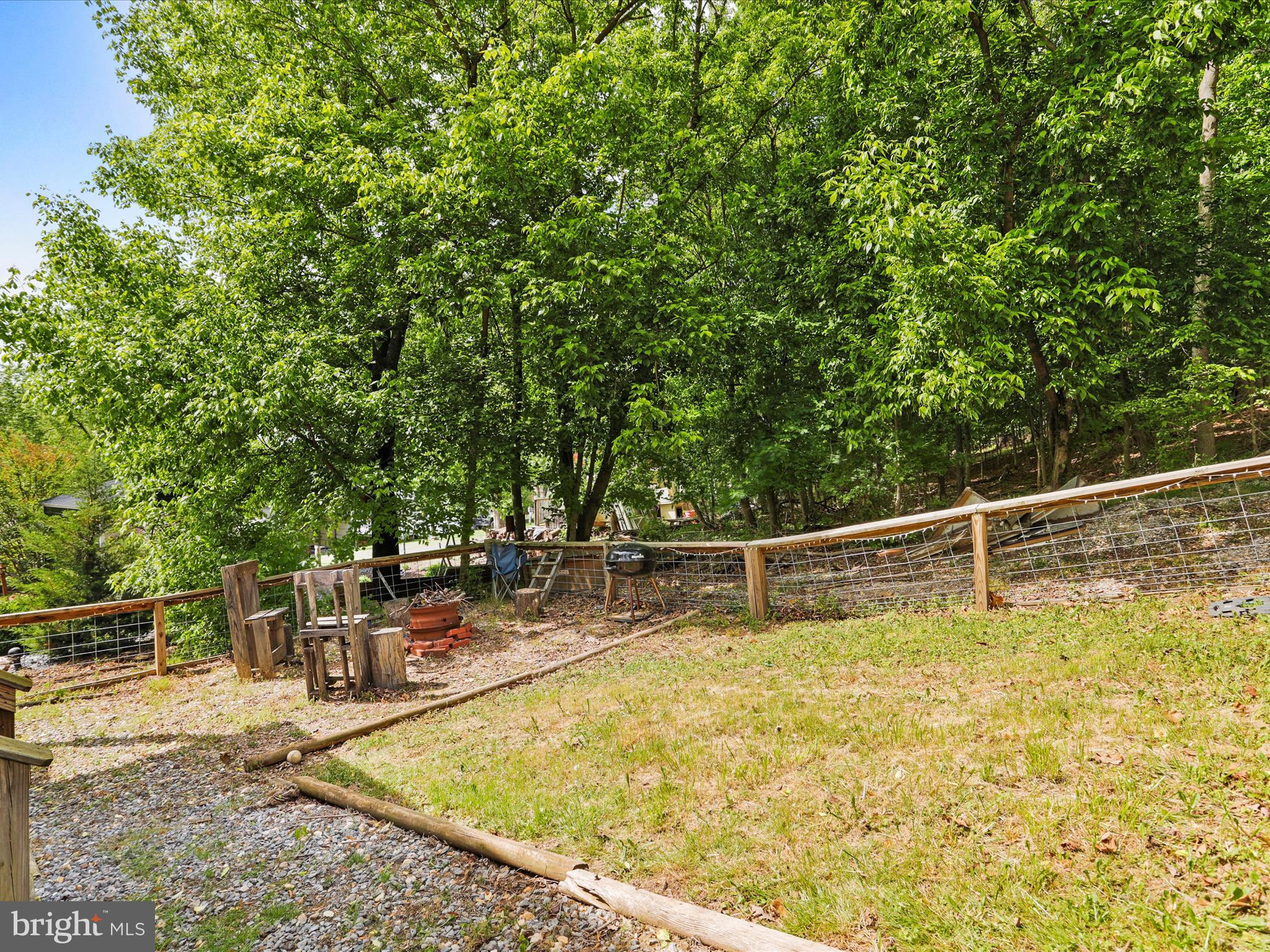 32 Forest Lane Falling Waters, WV 25419 - Photo 19 of 27 Sm. Fenced in area with fire pit