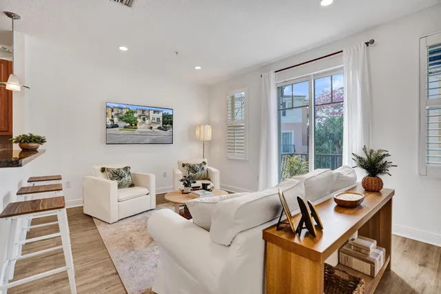 a living room with furniture and a table