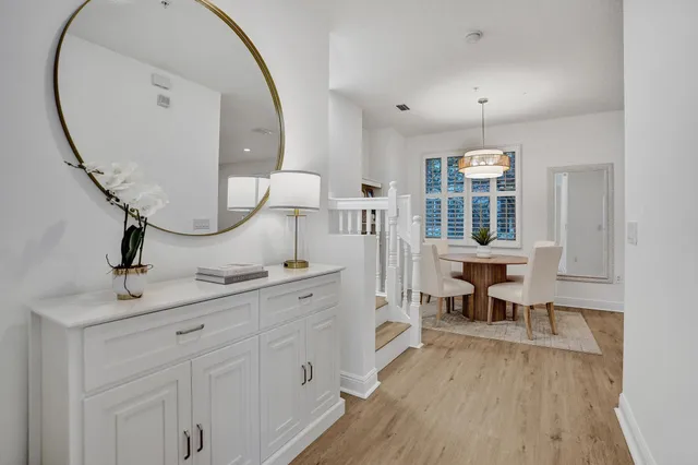 a kitchen with stainless steel appliances granite countertop a stove and a refrigerator