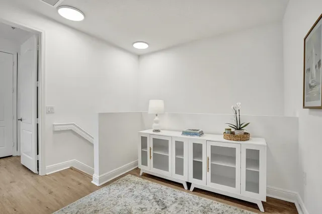 a hallway with cabinets