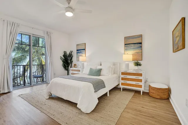 a bedroom with a bed and a view of bedroom