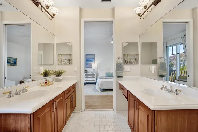 a bathroom with a bathtub shower sink and toilet